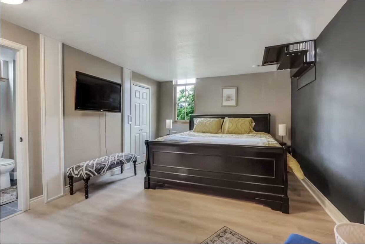 Main floor bedroom with king bed
