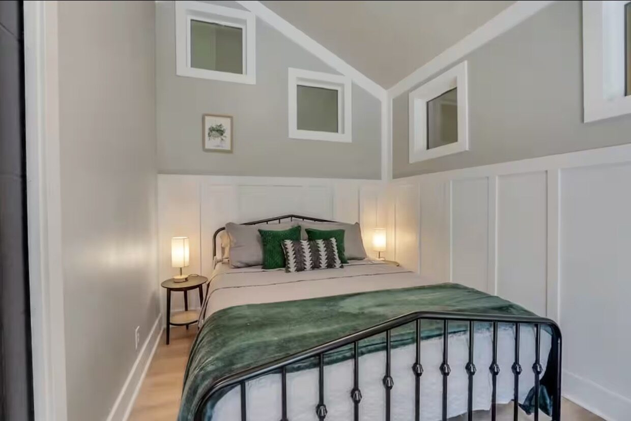 Upstairs bedroom with dormer windows