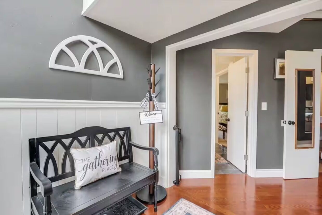 Entry hallway with "The Gathering Place" bench