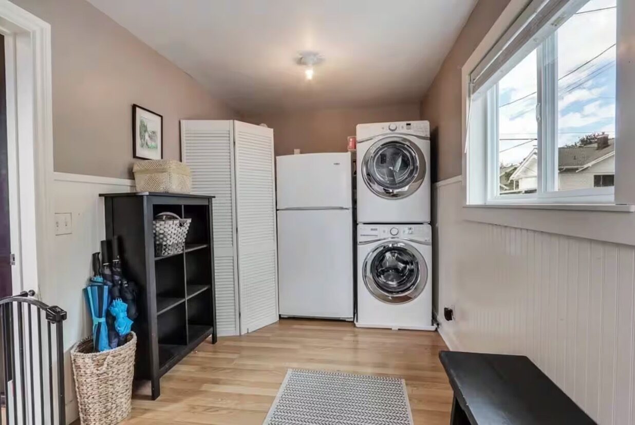 In-home laundry room with washer and dryer